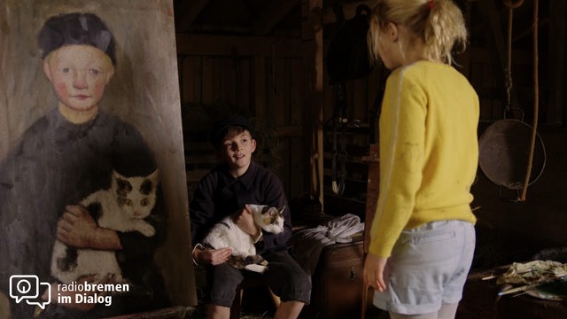 Juna Kramer, ein Junge mit Katze und ein Gemälde von Paula Modersohn-Becker