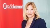 Die Intendantin von Radio Bremen, Yvette Gerner, lächelt in die Kamera.